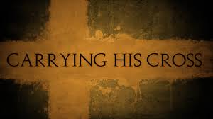Carrying His cross